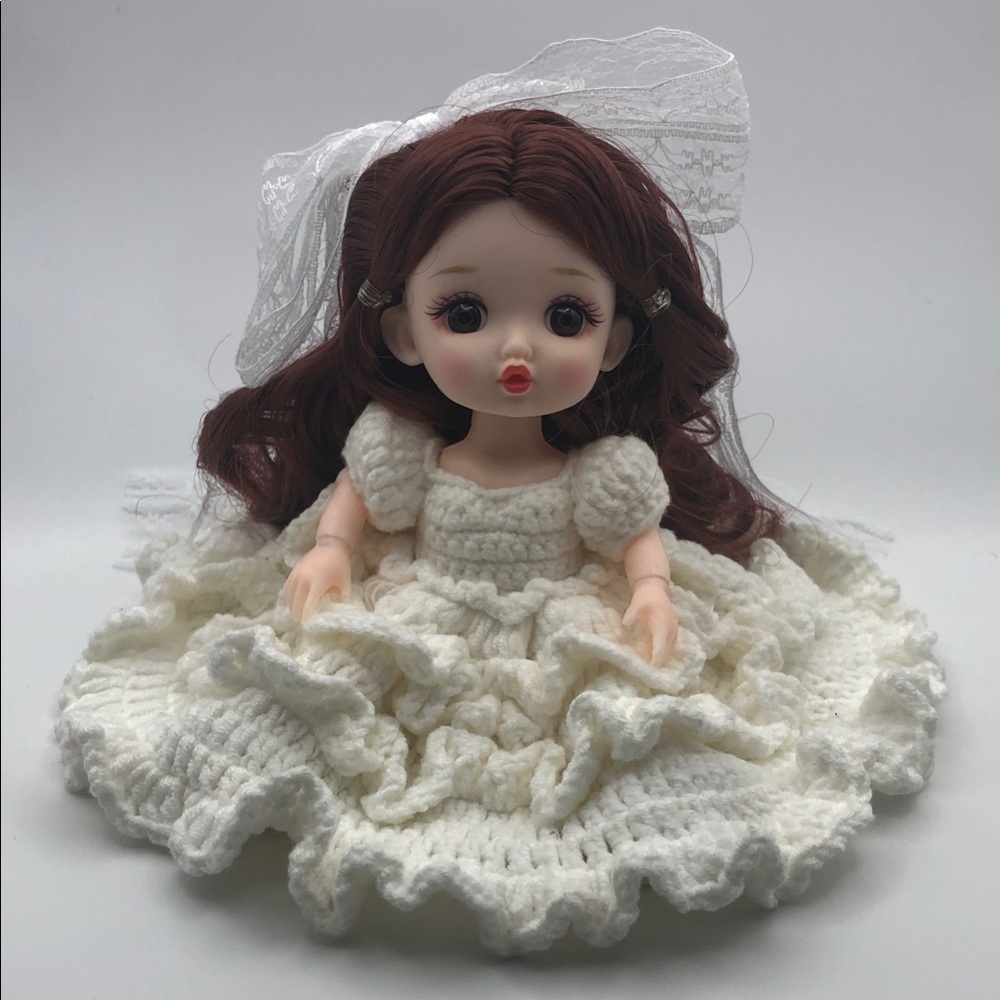 Doll With White Crochet Dress